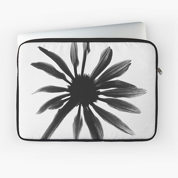 laptop and tablet cover with black flower on white background